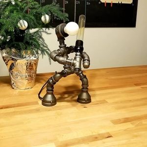 Industrial steel lamp person with (lightsaber)